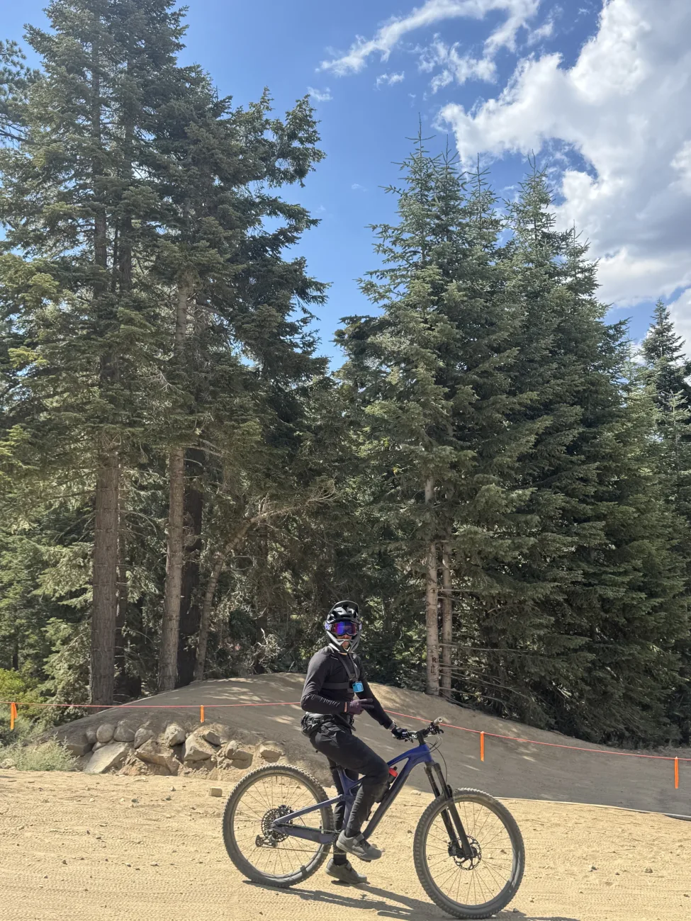 Pausing on a forest mountain bike trail